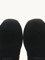 Semelle micro-cellulaire avec gomme anti-dérapante